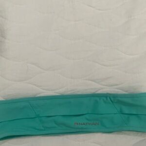 Nathan running belt fits over waist size medium